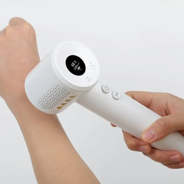 Person using UV308E portable 308nm LED UVB light device at home