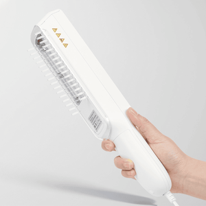 Hand holding BU-10 narrowband UVB lamp with irradiation window and light comb